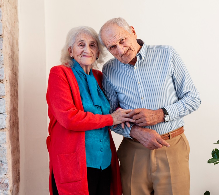 Elderly Couple holding hands